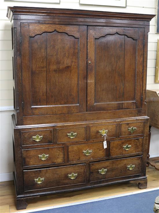 A George II oak press cupboard W.135cm